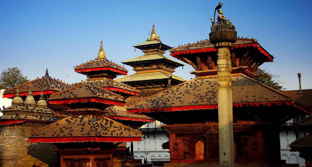 Ancient temples with tiered pagoda roofs at Kathmandu Durbar Square, a UNESCO World Heritage Site and one of the best things to do in Nepal for culture and history lovers.